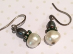 pearl earrings, pierced ears